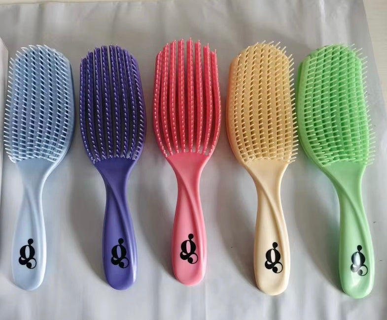 Manifest detangling brush